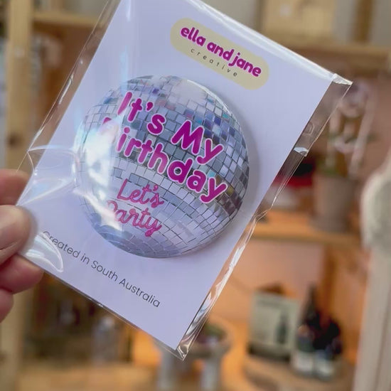 Disco Birthday Badge moving from side to side to show the different colour and shine