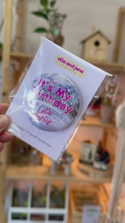 Disco Birthday Badge moving from side to side to show the different colour and shine